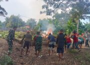 Bersihkan Pekuburan dan Pangkas Ranting, Babinsa Wettee Gelar Karya Bakti Massif Bersama Ribuan Warga