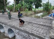 Progres Pembangunan Jembatan Garuda Merah Putih Desa Kanie Masuk Tahap Perakitan Besi Lantai